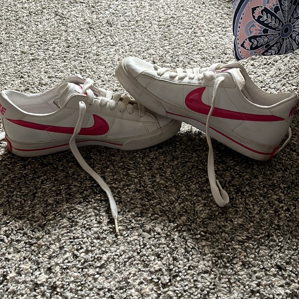 White and Pink Nike low top shoes